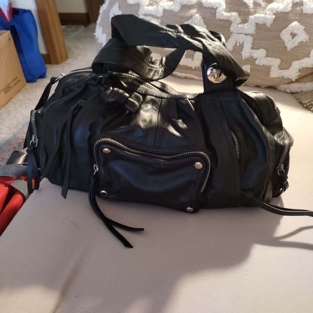 NwOT Junior Drake Black leather Barrel purse
